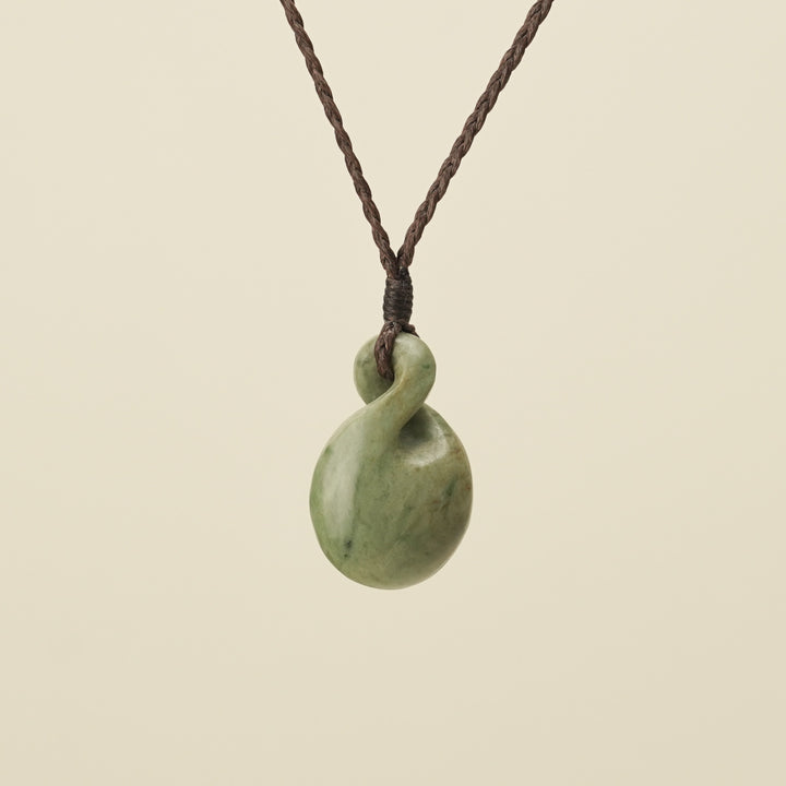 Pikorua Raukaraka Round Small Pounamu Pendant, Brown Binding
