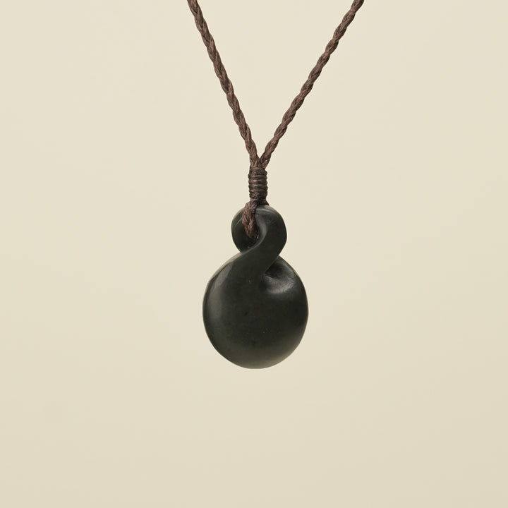 Pikorua Kawakawa Round Small Pounamu Pendant, Brown Binding