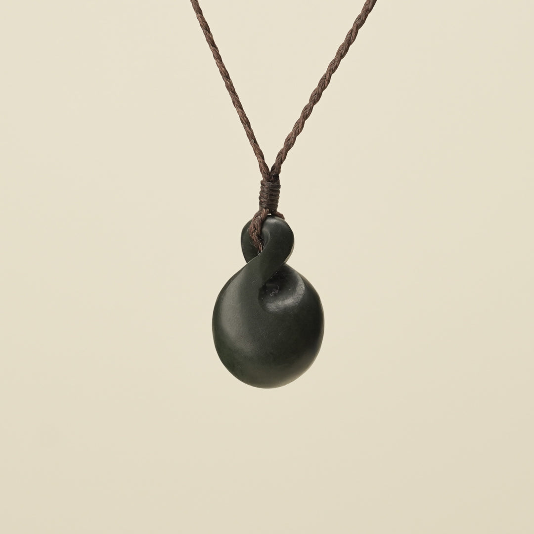 Pikorua Kawakawa Round Small Pounamu Pendant, Brown Binding