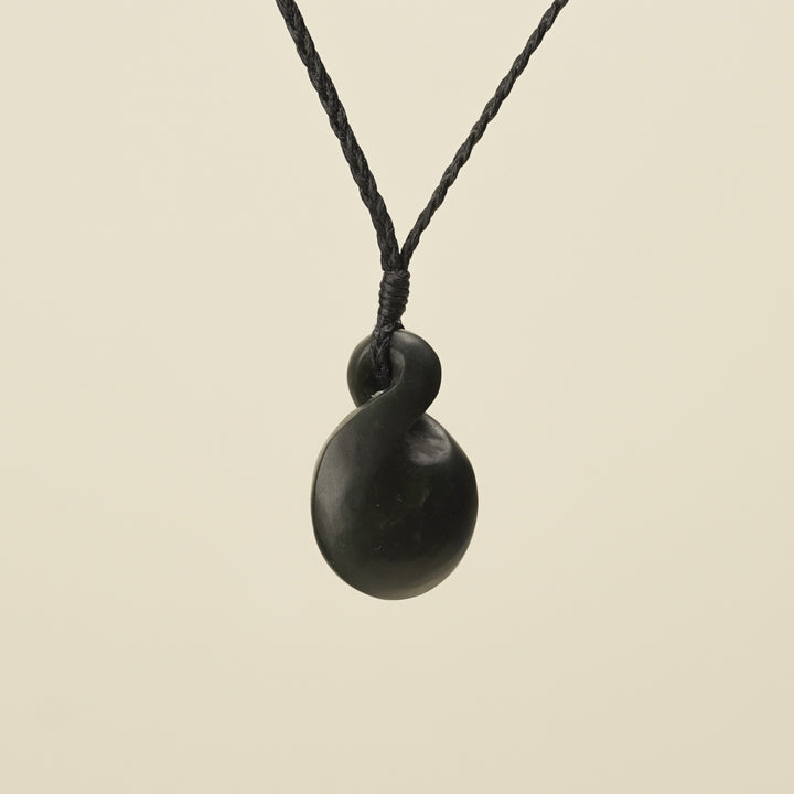 Pikorua Kawakawa Round Small Pounamu Pendant, Black Binding
