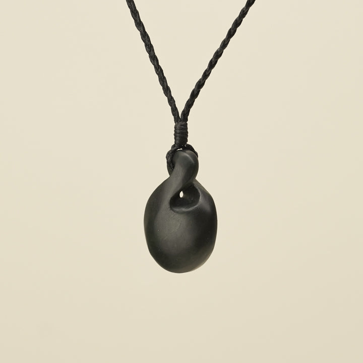 Pikorua Kawakawa Round Small Pounamu Pendant, Black Binding