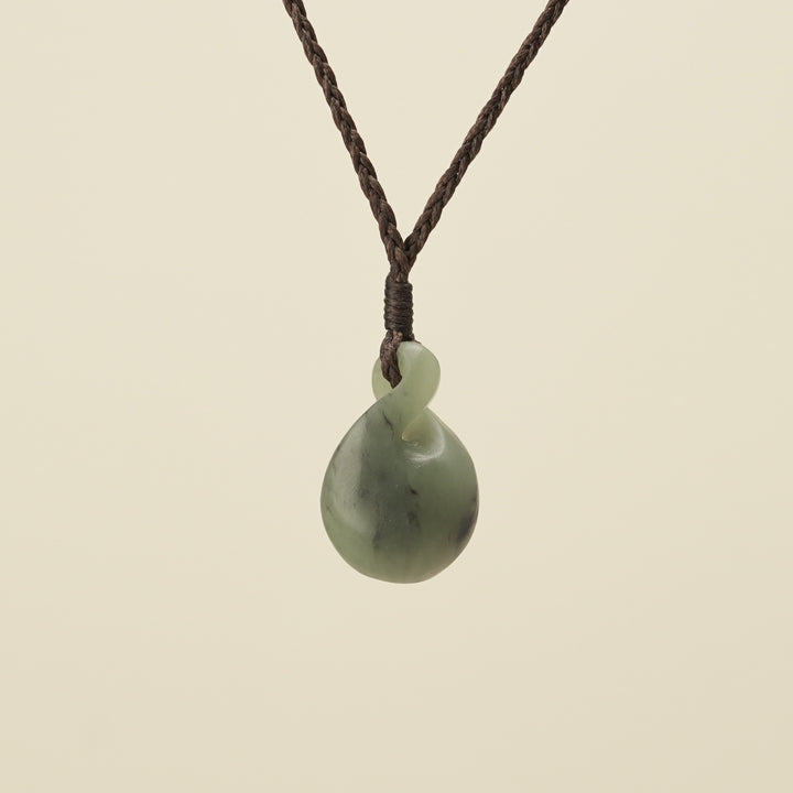 Pikorua Inanga Round Small Pounamu Pendant, Brown Binding