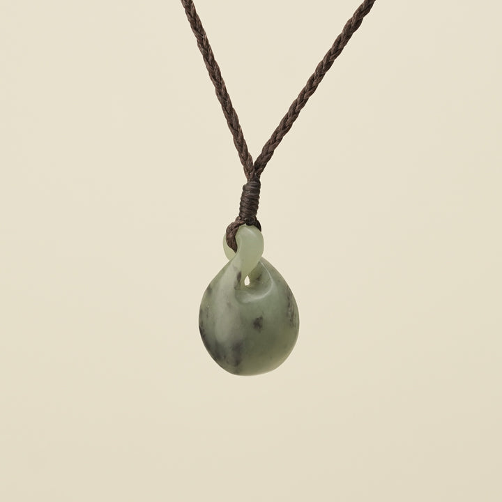 Pikorua Inanga Round Small Pounamu Pendant, Brown Binding