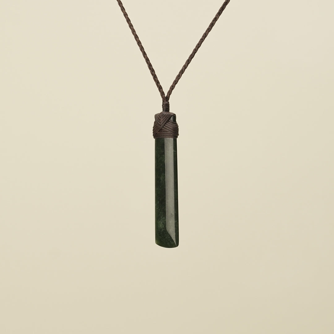 Kawakawa Toki Medium Pounamu Pendant Brown Binding