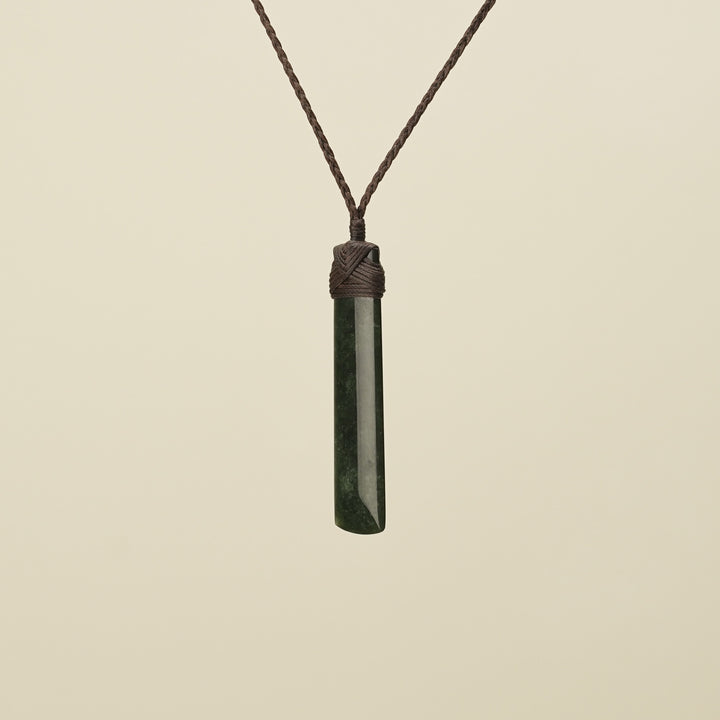 Kawakawa Toki Medium Pounamu Pendant Brown Binding