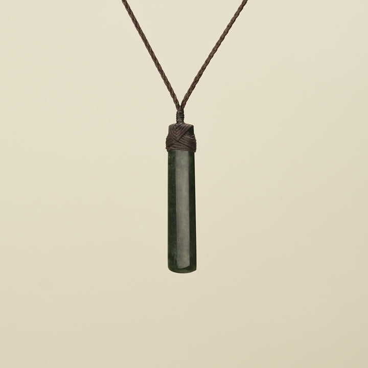 Kawakawa Toki Medium Pounamu Pendant Brown Binding