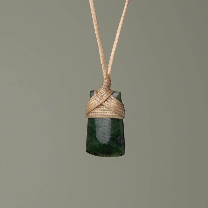 Pēpi Pounamu Toki, Tan Binding
