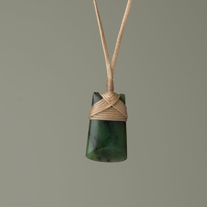 Pēpi Pounamu Toki, Tan Binding