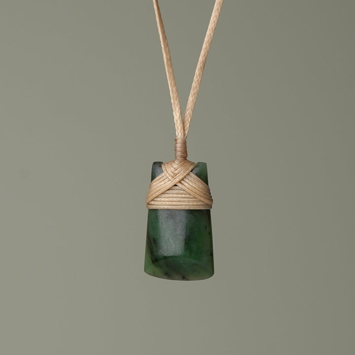 Pēpi Pounamu Toki, Tan Binding