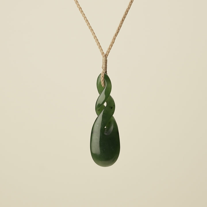 Double Pikorua Kawakawa Pounamu Pendant, Tan Binding