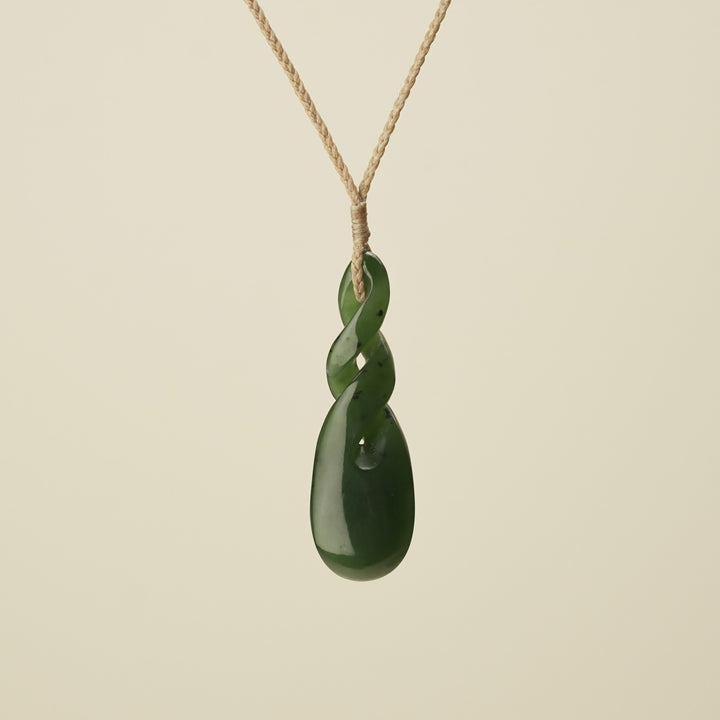Double Pikorua Kawakawa Pounamu Pendant, Tan Binding