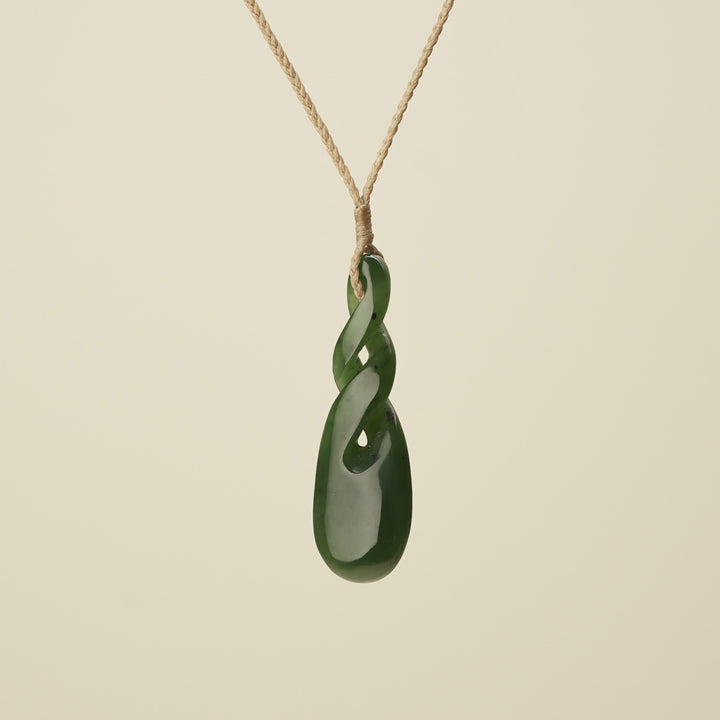 Double Pikorua Kawakawa Pounamu Pendant, Tan Binding