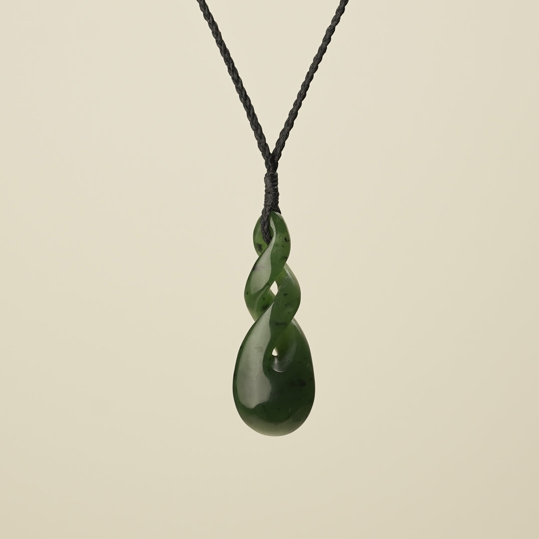 Double Pikorua Kawakawa Pounamu Pendant, Black Binding