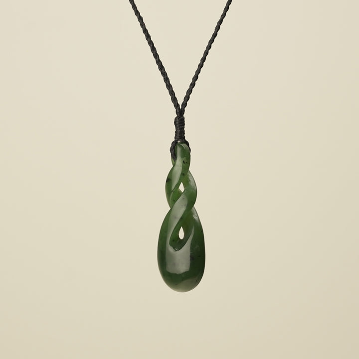 Double Pikorua Kawakawa Pounamu Pendant, Black Binding