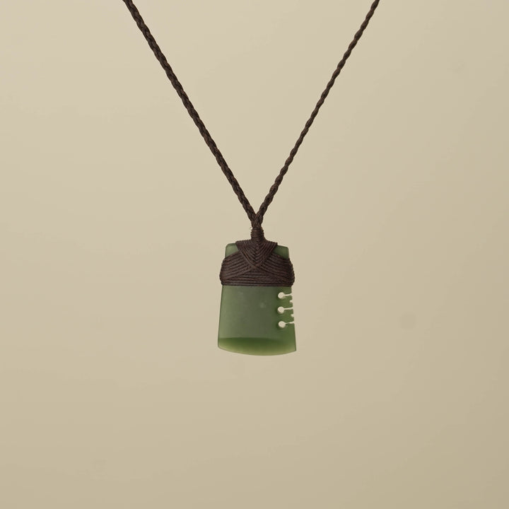 Notched Kawakawa Small Toki Pounamu Pendant, Brown Binding