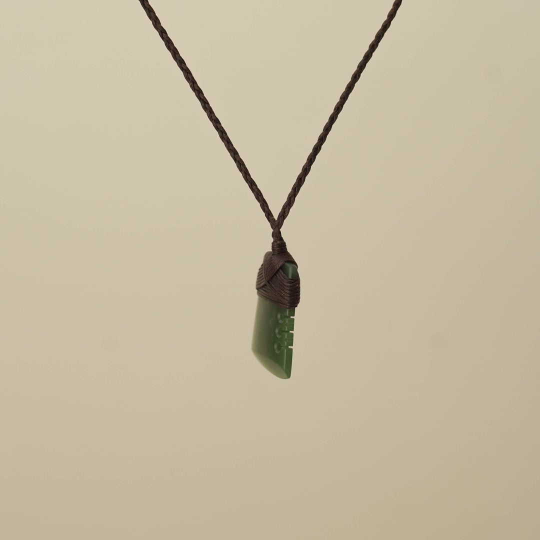Notched Kawakawa Small Toki Pounamu Pendant, Brown Binding