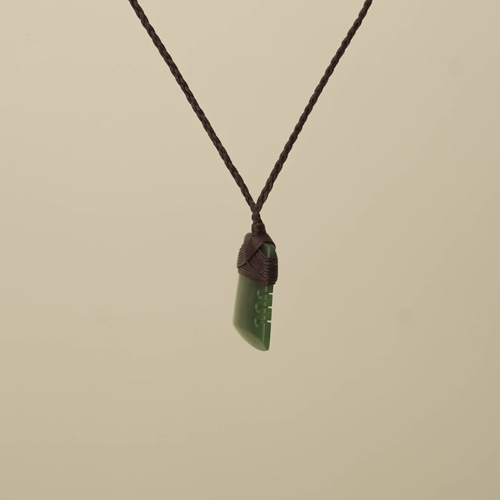 Notched Kawakawa Small Toki Pounamu Pendant, Brown Binding