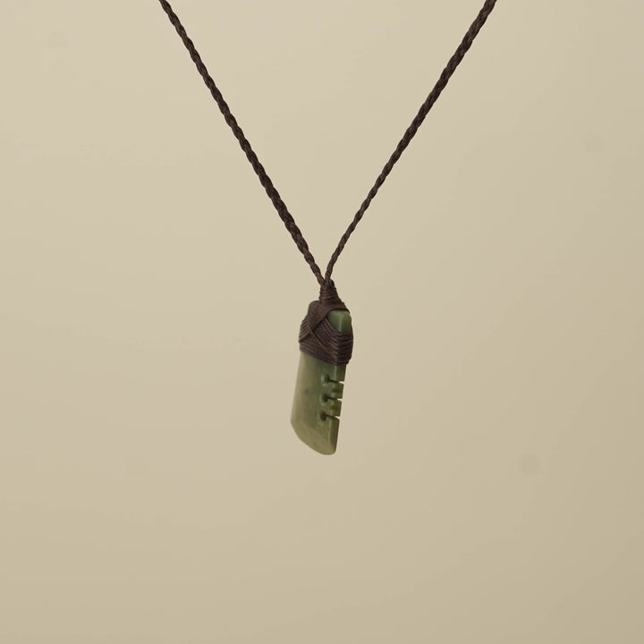 Notched Raukaraka Small Toki Pounamu Pendant, Brown Binding