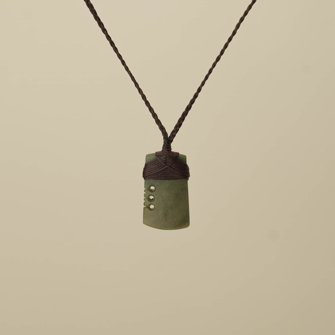 Notched Raukaraka Small Toki Pounamu Pendant, Brown Binding