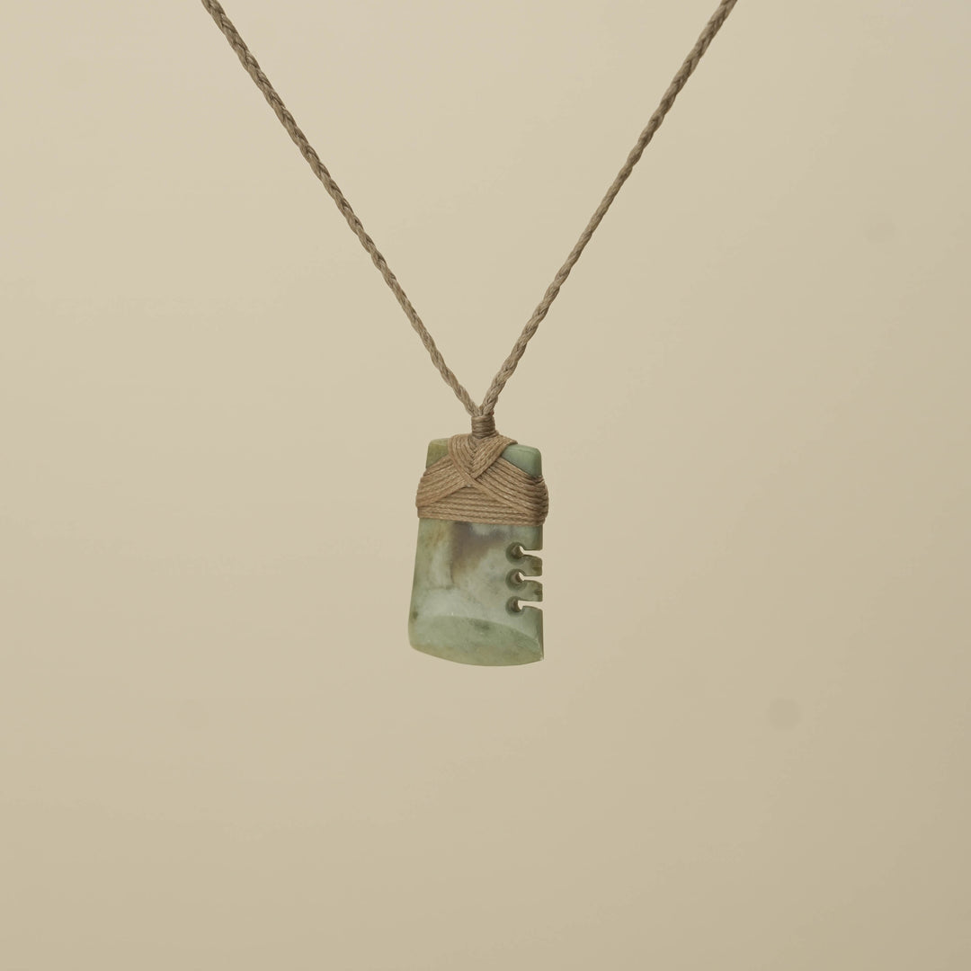 Notched Inanga Small Toki Pounamu Pendant, Tan Binding