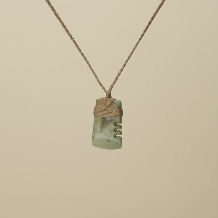Notched Inanga Small Toki Pounamu Pendant, Tan Binding
