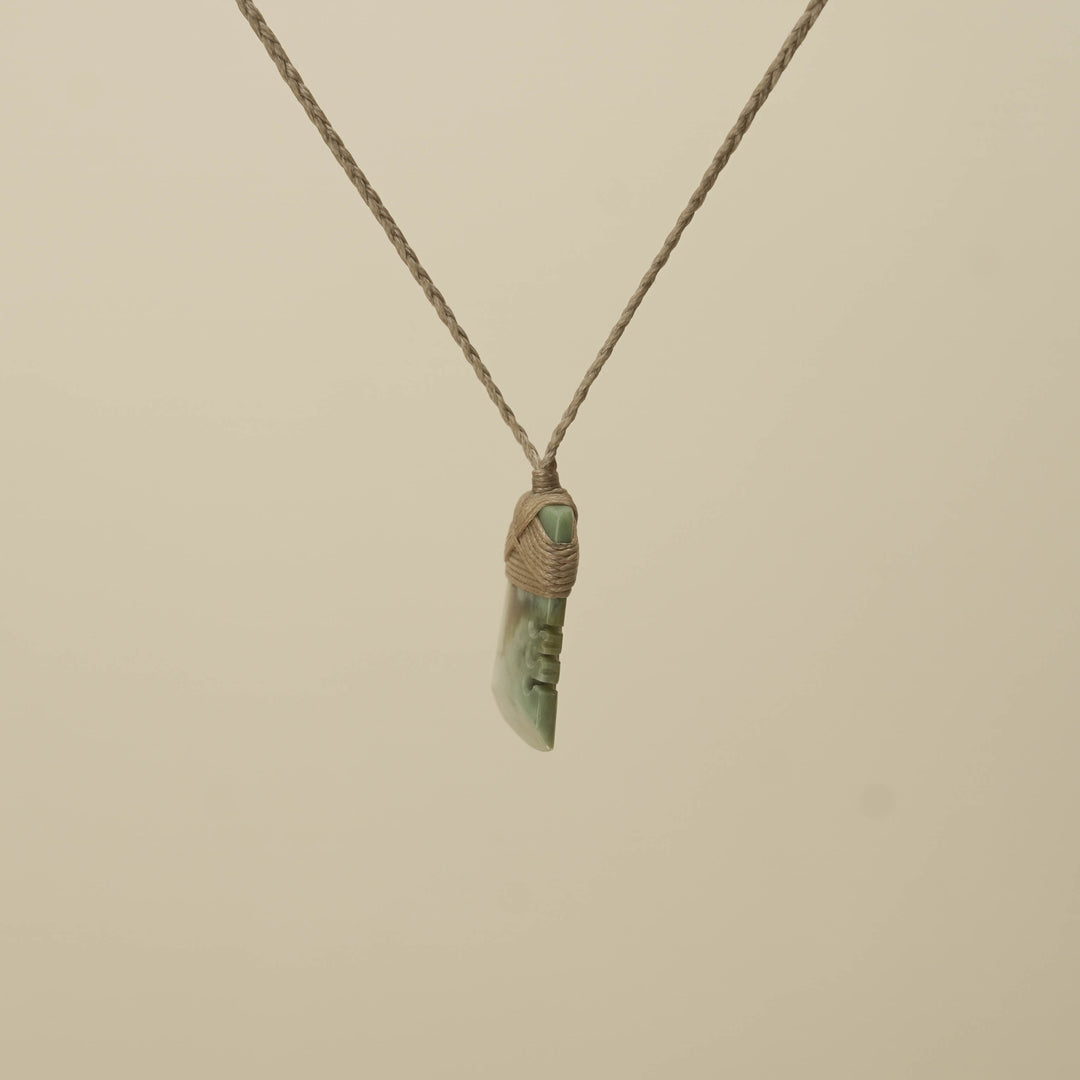 Notched Inanga Small Toki Pounamu Pendant, Tan Binding