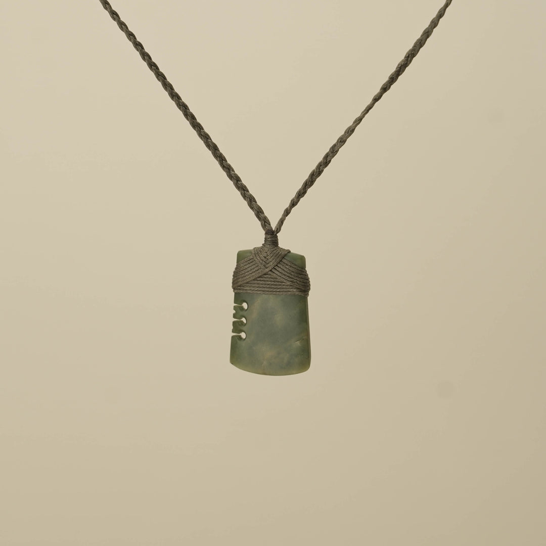 Notched Raukaraka Small Toki Pounamu Pendant, Khaki Binding