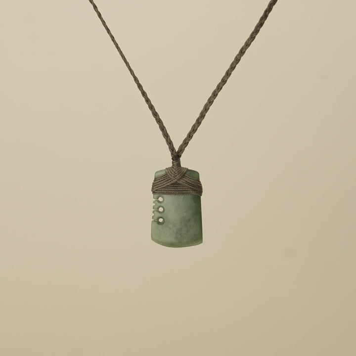 Notched Kahurangi Inanga Small Toki Pounamu Pendant, Khaki Binding