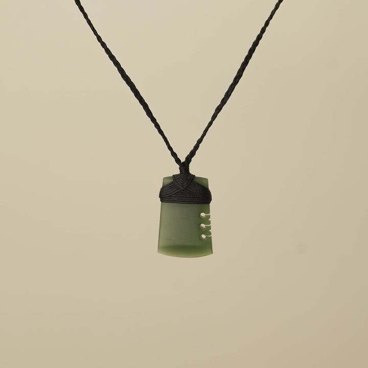 Notched Small Kahurangi Toki Pounamu Pendant, Black Binding