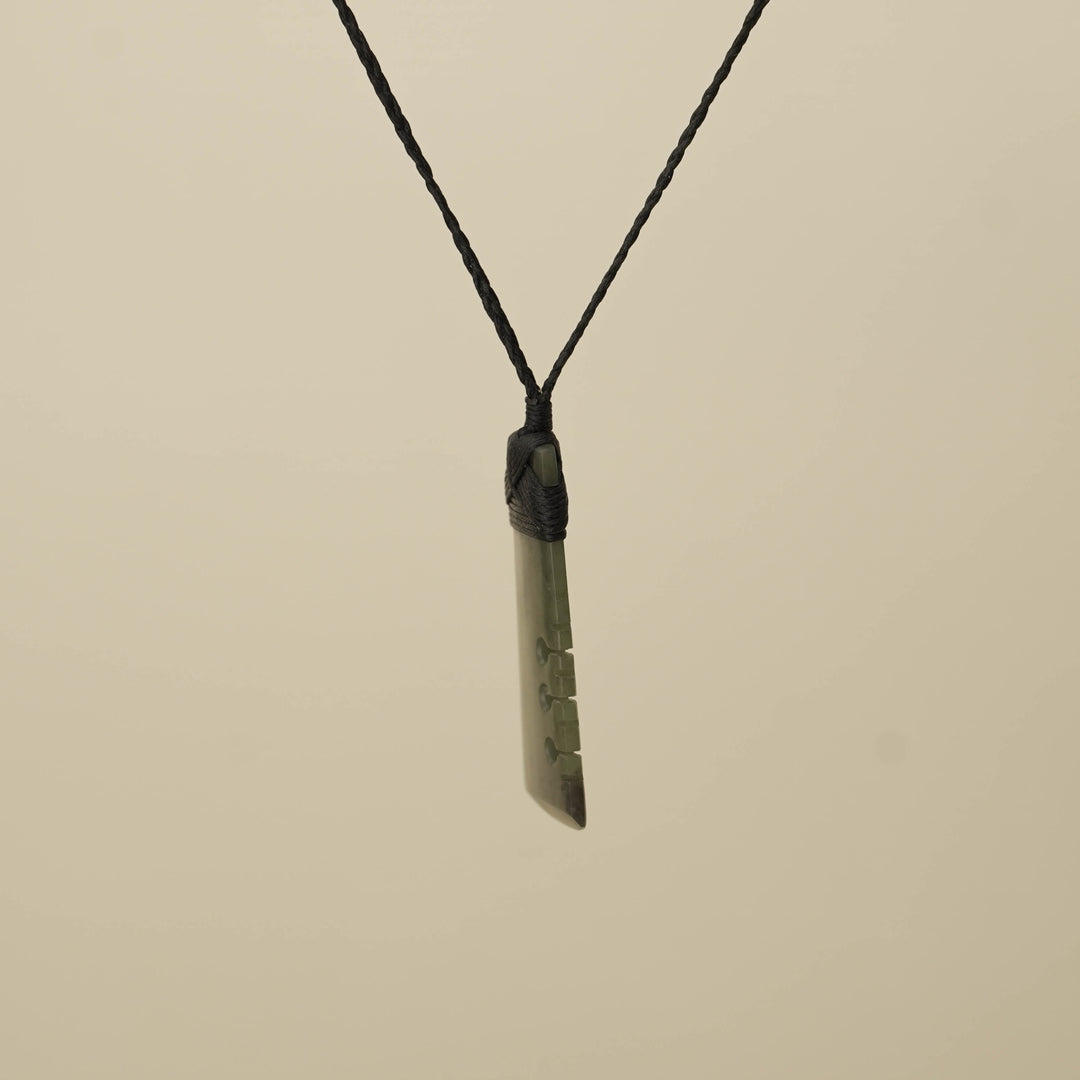 Notched Toki Hapopo Medium Pounamu Pendant, Black Binding