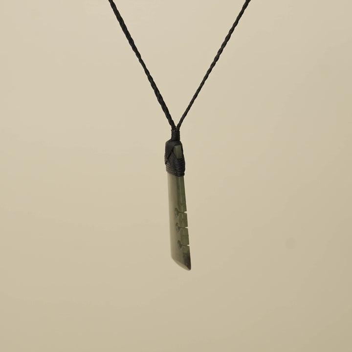 Notched Toki Hapopo Medium Pounamu Pendant, Black Binding