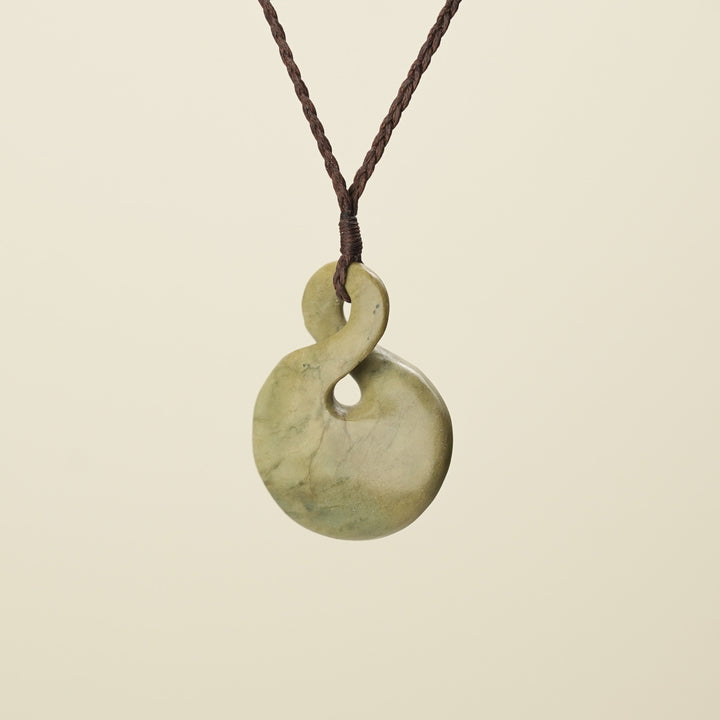 Pikorua Raukaraka Large Pounamu Penant, Brown Binding