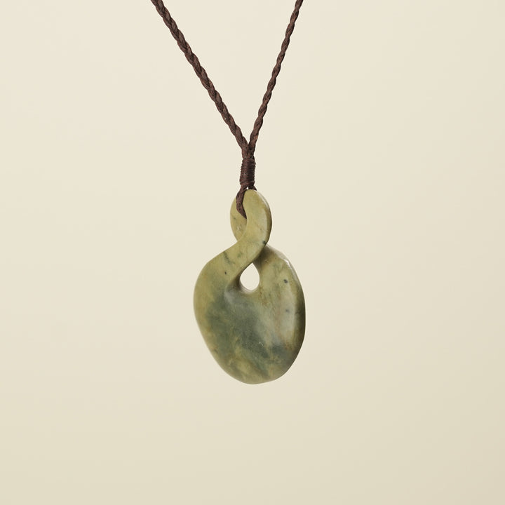 Pikorua Raukaraka Large Pounamu Penant, Brown Binding