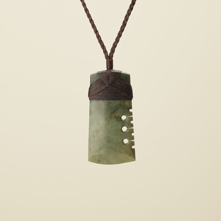 Notched Toki Raukaraka Medium Pounamu Pendant, Brown Binding