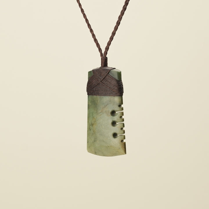 Notched Toki Raukaraka Medium Pounamu Pendant, Brown Binding