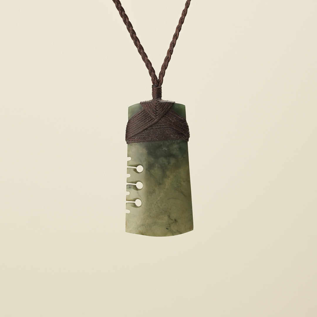 Notched Toki Raukaraka Medium Pounamu Pendant, Brown Binding