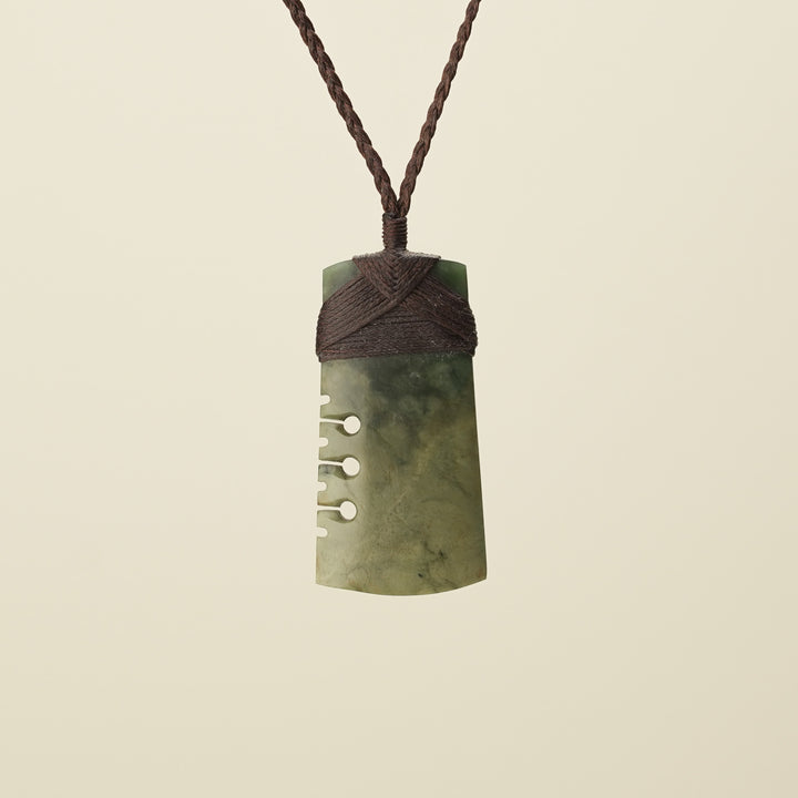 Notched Toki Raukaraka Medium Pounamu Pendant, Brown Binding