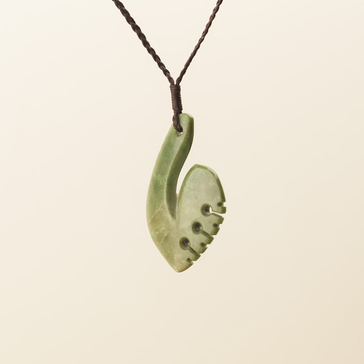 Raukaraka Medium Hei Matau Pounamu Pendant