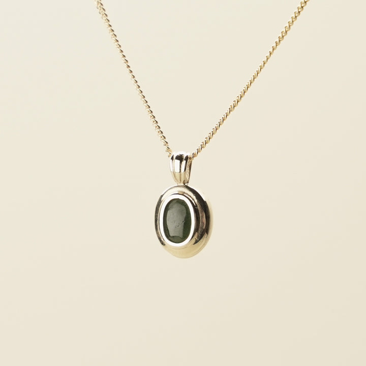 Kawakawa Pounamu Oval Pendant in 9k Gold