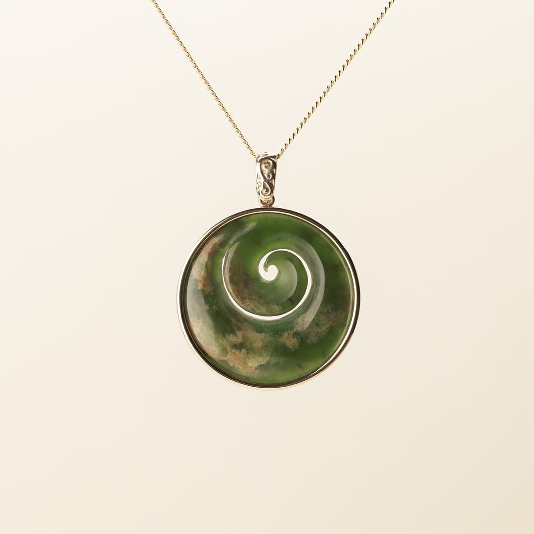 Flower Pounamu Medium Koru Pendant in 9k Gold