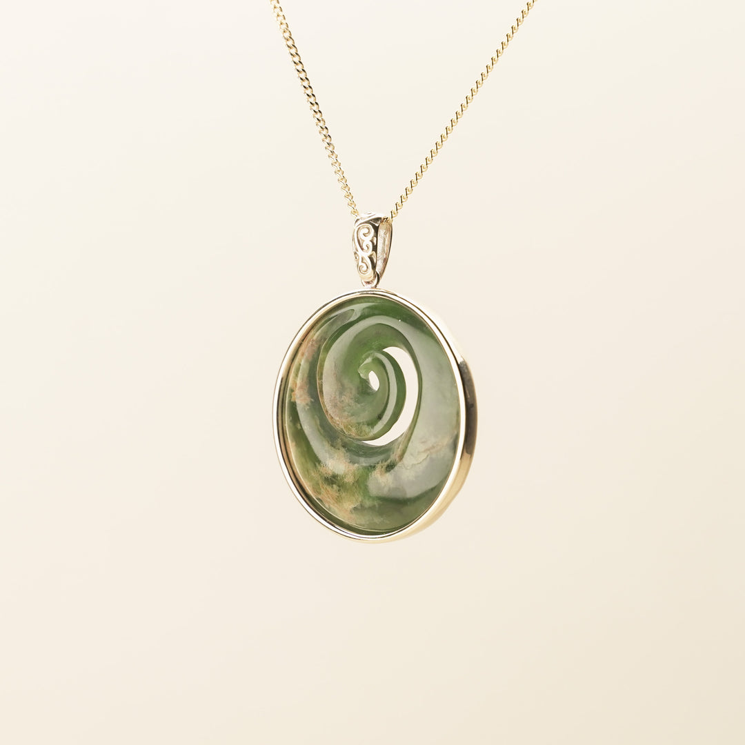 Flower Pounamu Medium Koru Pendant in 9k Gold