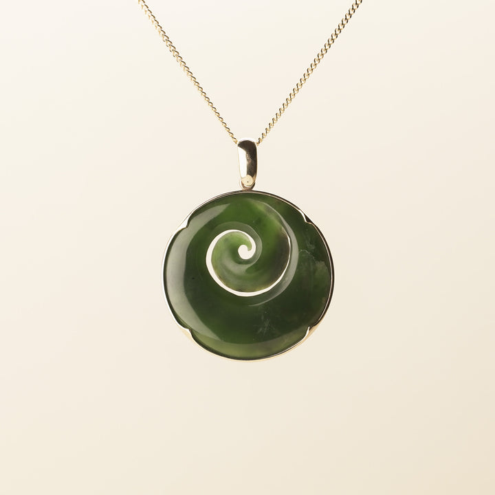 Flower Pounamu Medium Koru Pendant in 9k Gold
