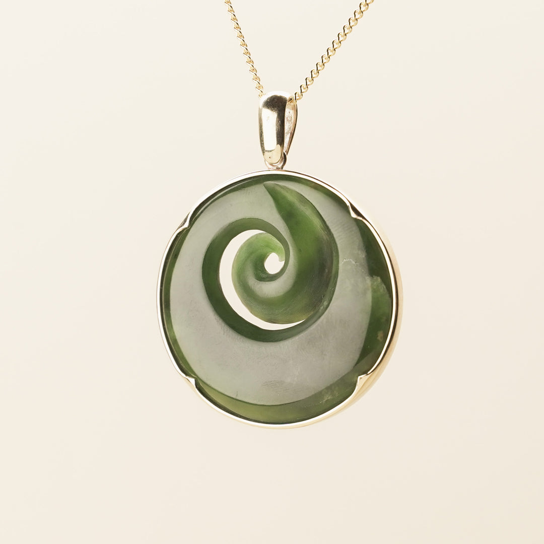 Flower Pounamu Medium Koru Pendant in 9k Gold