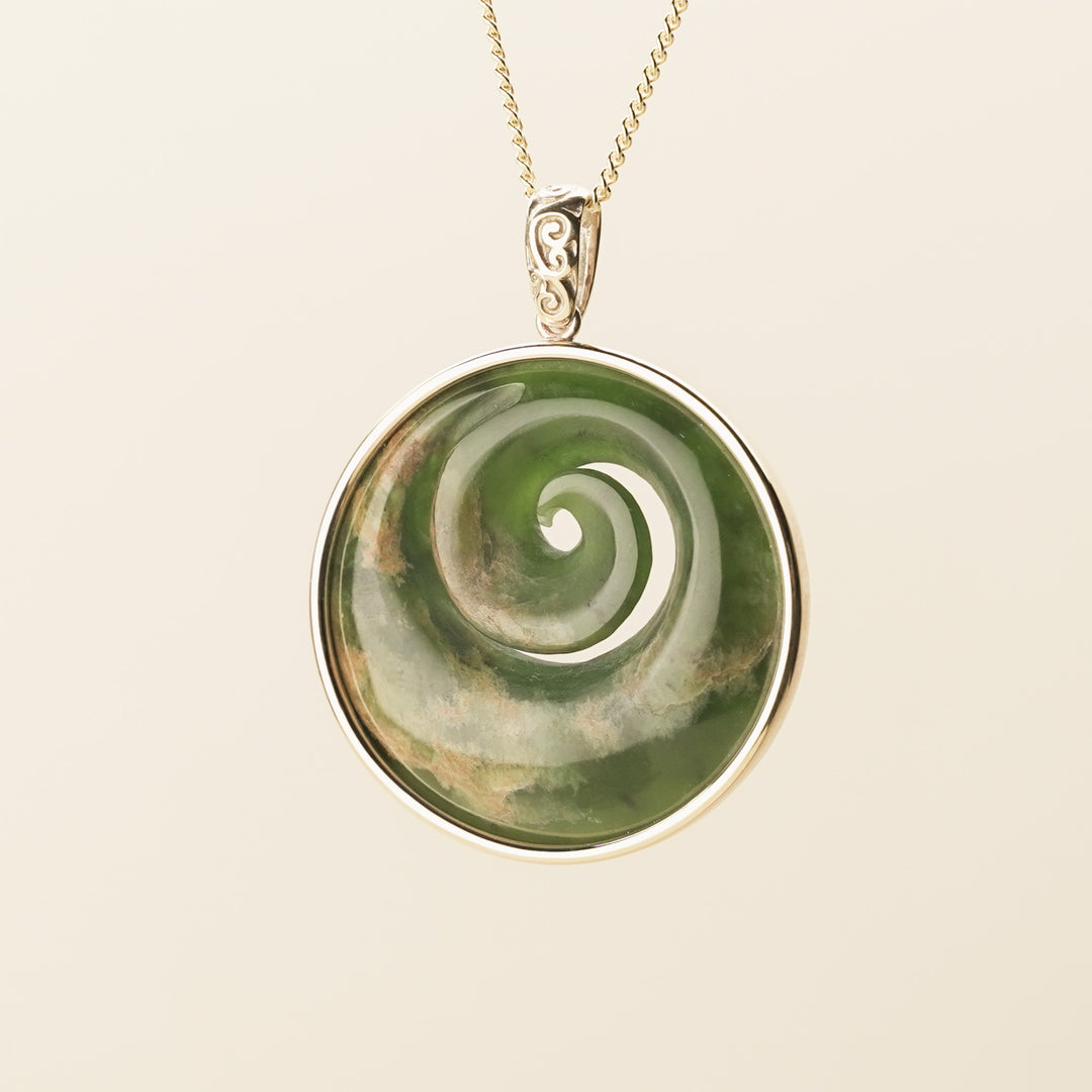 Flower Pounamu Medium Koru Pendant in 9k Gold