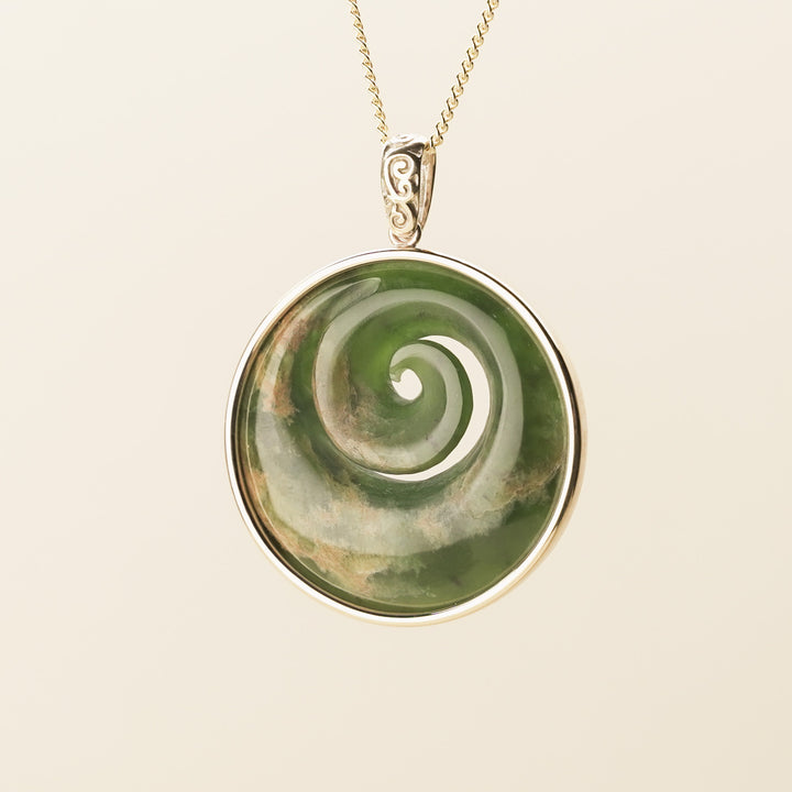 Flower Pounamu Medium Koru Pendant in 9k Gold