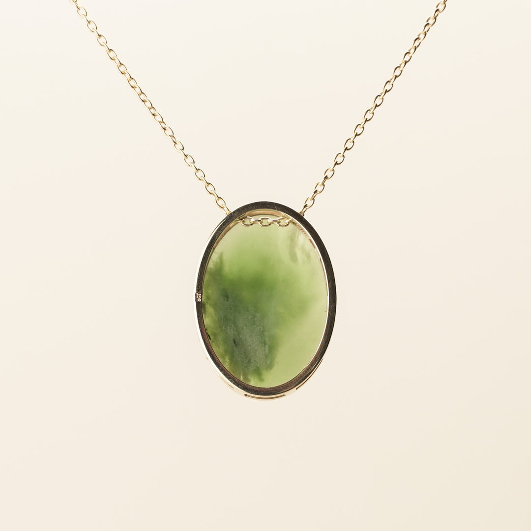 Flower Pounamu Oval Pendant in 9k Gold