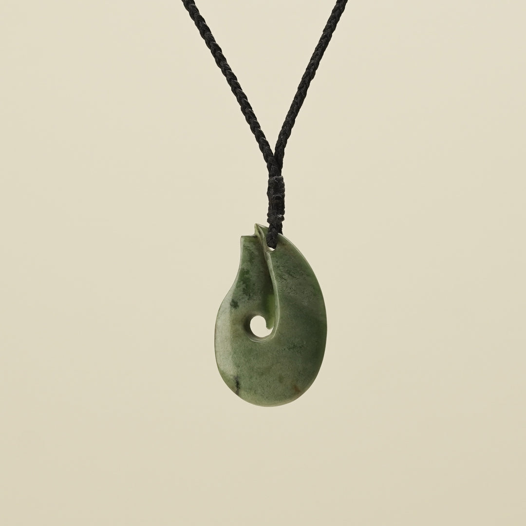 Hei Matau Flower Putiputi Pounamu Pendant, Black Binding