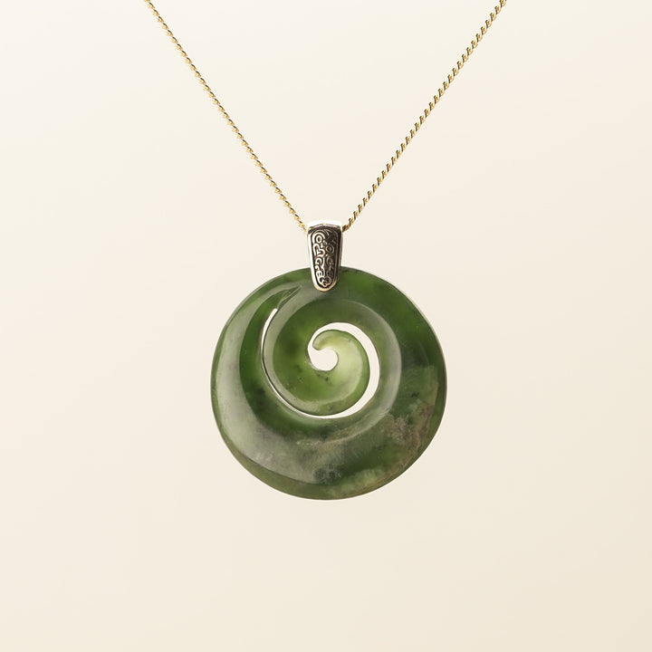 Flower Pounamu Porowhita Koru Pendant with Tiki Bail