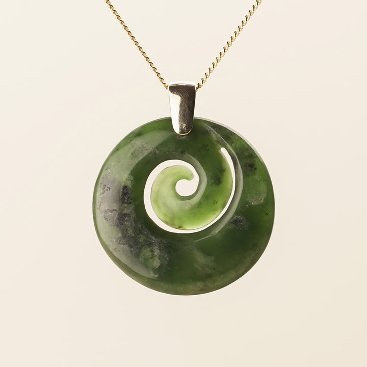 Flower Pounamu Porowhita Koru Pendant with Tiki Bail