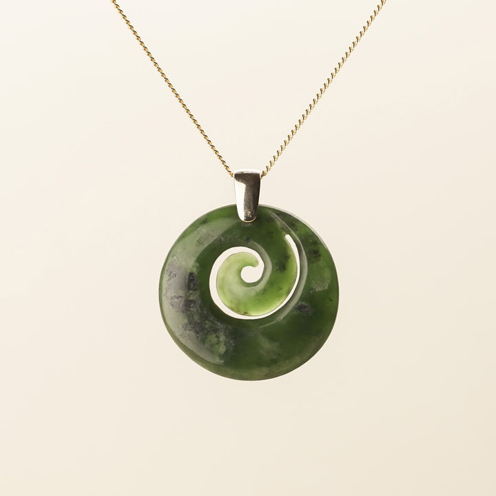 Flower Pounamu Porowhita Koru Pendant with Tiki Bail